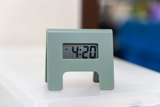 a clsoeup shot of modern clock showing time