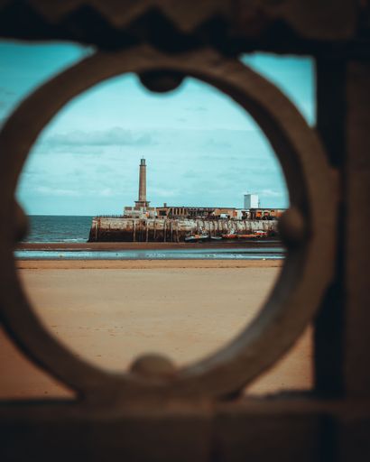 Big ship in a port seen from a porthole