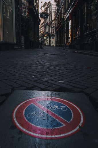 A vertical shot of streets and buildings of Amsterdam in the early morning, Netherlands