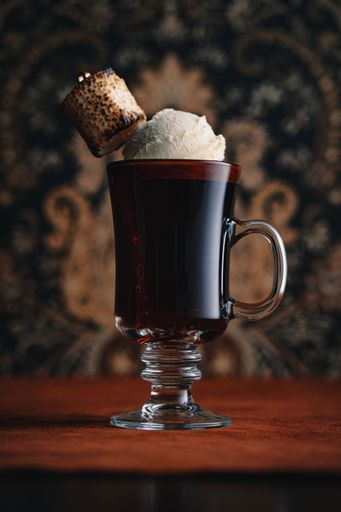 A vertical closeup shot of Coffee with Ice Cream and Marshmallow