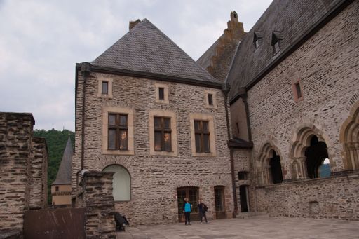 A historic stone brick building exterior in Vianden, Luxembourg