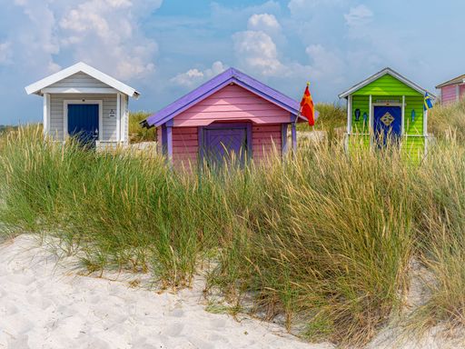 A beautiful shot of small huts at the beach in Skanor, Skane County, Sweden