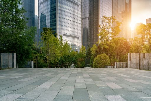 An empty ground floor in front of modern office buildings in the city downtown district
