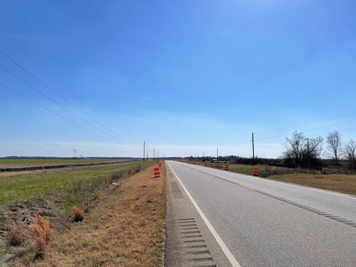 Burke County, Ga USA - 02 10 22: Country roads in South Georgia blue sky