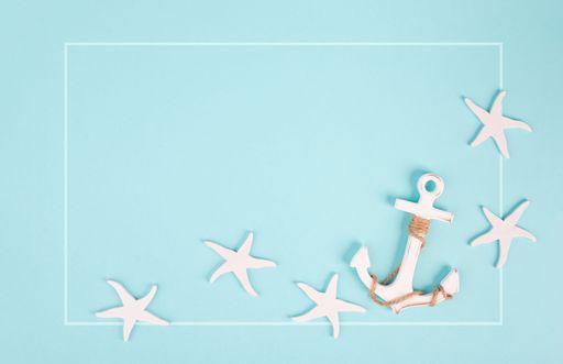 Blue colored summer and vacation background, anchor and sea stars building a frame, copy space for text, holiday and tourism concept