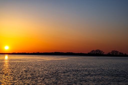 A mesmerizing view of the golden sunset over the sea