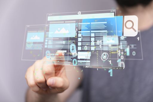 A 3D render of a holographic website near a hand
