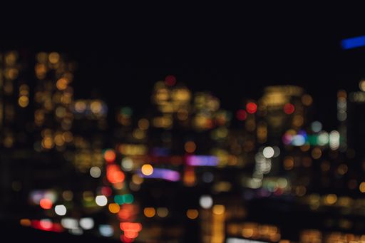 de focused city lights at night, bokeh