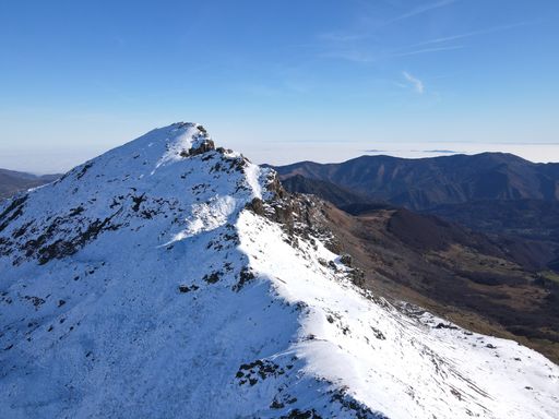A beautiful view of the Italian alps under the blue sky on a cold winter day