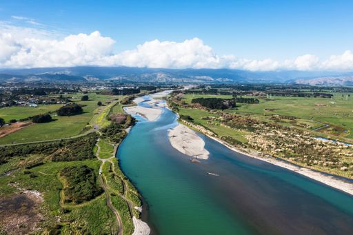 Aerial shot at the otaki river mouth on the Kapiti coast on a fine autumn day.  Looking upstream towards the Tararua Ranges and Otaki township