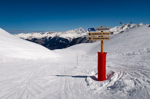 Courchevel, France, April 5 2022, signpost to luxury town courchevel in skiing area trois valles translation: three valleys