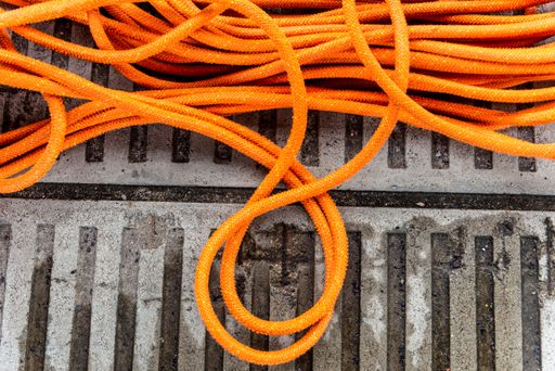An orange rope exclusively for the practice of rappeling