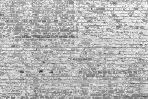 Old red brick wall. Peeling white paint on a red wall.