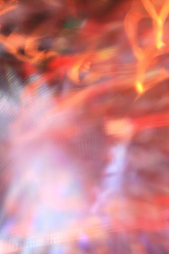 A vertical shot of glow vortex light effect on a dark background