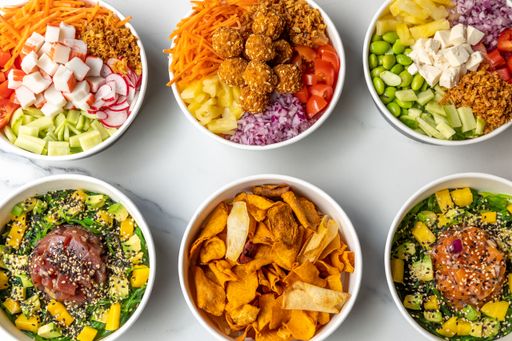 The top view of different veggie dishes - healthy salad bowls