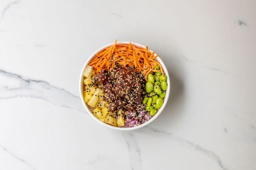 A bowl of poke with sesame seeds topping -healthy meal