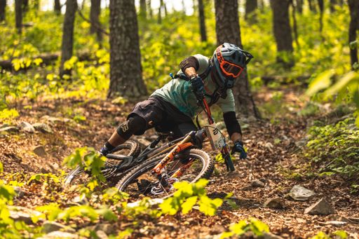 A closeup of a racer taking on challenges of the Southern Enduro Tour Race in Big Cedar, Oklahoma, US