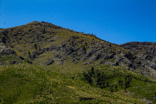 A mountain range in Tornquist, Argentine under blue sky