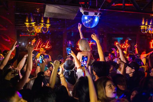The crowd of people partying in The Reserve Liquor Lounge Bar located in Pasig City