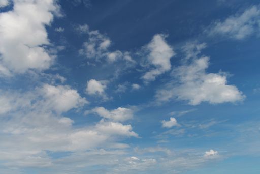 A low angle shot of the magnificent fluffy clouds in the beautiful sky