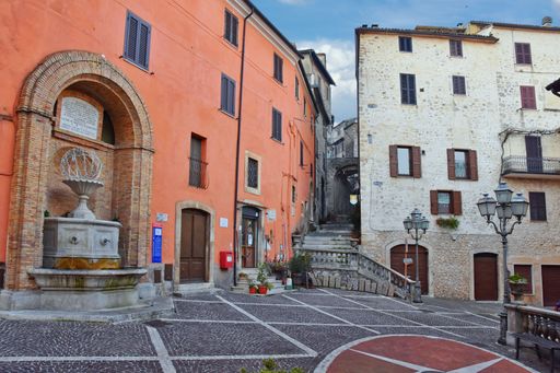 A narrow street with old houses in Guarcino, a village near Rome, Italy