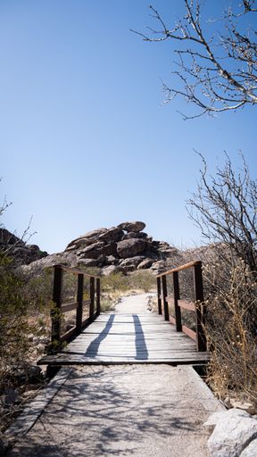 A vertical shot of a hiking trail in Hueco Tanks, El Paso, Texas, USA