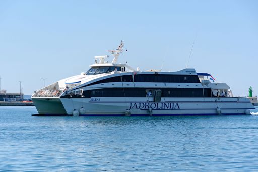 A catamaran passenger ship entering port of Split in Croatia