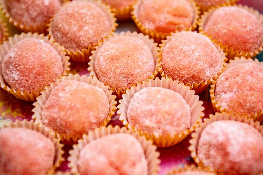 A closeup shot of the traditional Brazilian Brigadeiros pink sweets