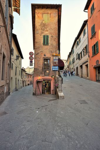 A beautiful shot of the medieval houses and streets of the Montepulciano town on a sunny day in Siena Province, Tuscany, Italy