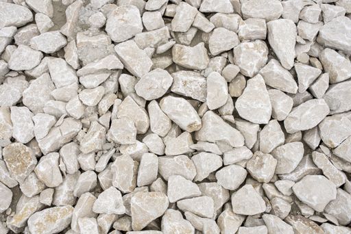 An overhead of a pile of white limestone rocks - great for industrial backgrounds