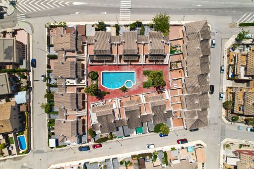 An aerial view of Torre de la Horadada residential houses with swimming pool in the Mediterranean Sea
