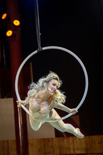 woman in air flying with hoop