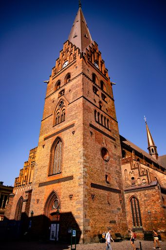 A vertical shot of St. Peter's Church in Malmo, Sweden in blue sky background