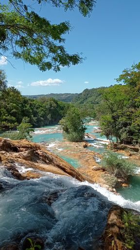 A vertical shot of the Agua Azul (blue water) waterfall cascade in Chiapas, Mexico