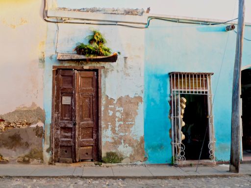 beautiful vivid colors of cuban streets in trinidad, ruined old buildings with powerful colors