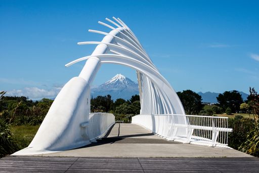 Thee Whakarewa bridge in New Plymouth in New Zealand, snowy Mt Taranaki in background