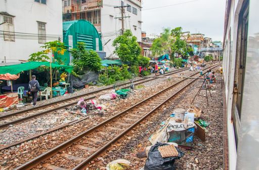 Poor people live between the train tracks directly at the Central Railway Station