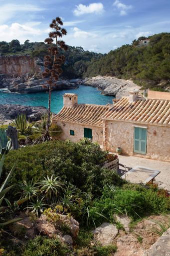 A vertical shot of Cala s'Almunia in Majorca, Balearic Islands, Spain