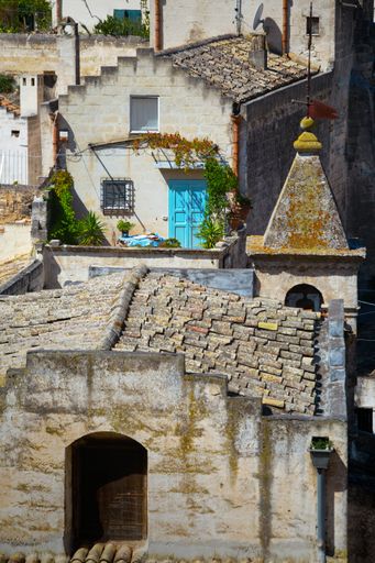 A vertical shot of the old buildings of ancient Matera city in Italy