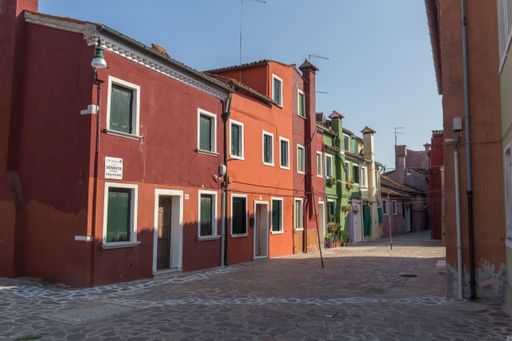 Many beautiful colorful buildings along the streets of Venice in Italy during the daytime