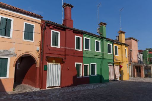 Many beautiful colorful buildings along the streets of Venice in Italy during the daytime