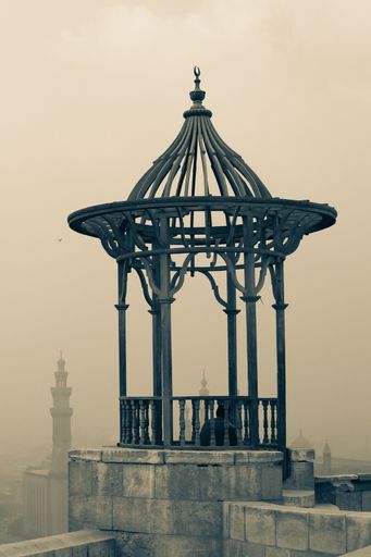 A round pergola on Mokattam mountain overlooking the polluted Cairo city in Egypt
