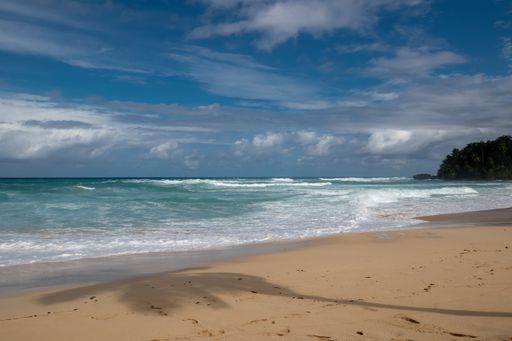 A beautiful Sunny day at the beach of Playa Grande Rio San Juan under cloudy sky, Dominican Republic