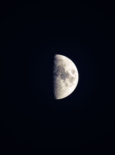 A scenic view of halfmoon in the sky isolated on black background