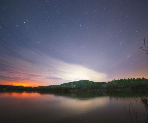 A mesmerizing view of the twilight over Sylva River, Russia