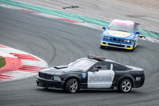 Ford Mustang drifting on the race track