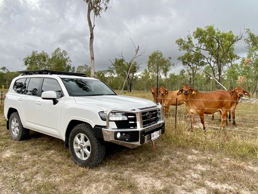 A white Toyota 4WD Wagon on a cattle property in North Queensland, Australia