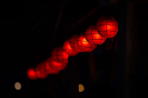 A selective focus shot of red Chinese lanterns with blur background