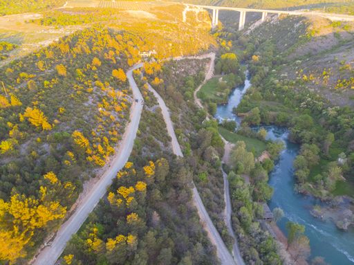 Kravice waterfalls in Bosnia Herzegovina, with a floating wooden bridge.