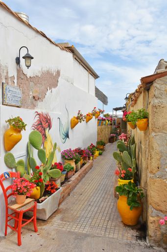 A narrow street in Marzameni, a small village in Sicily, Italy